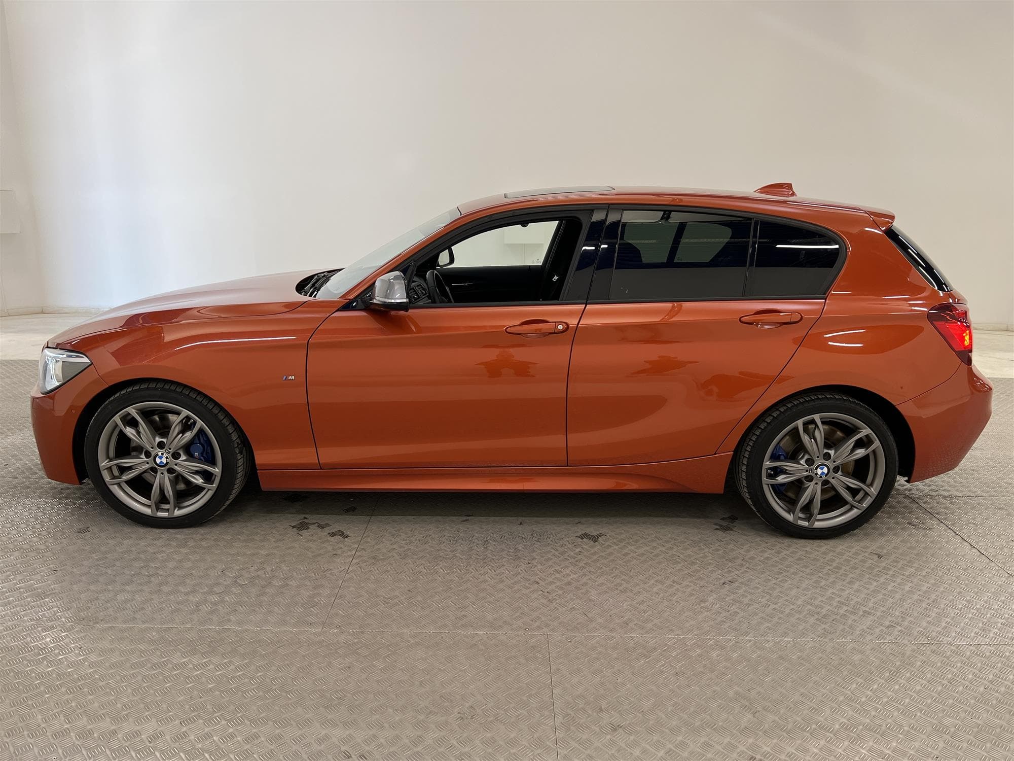 BMW M135i xDrive 320hk